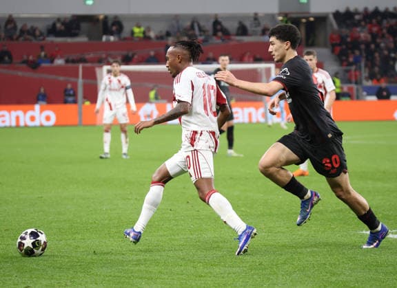v l Gelson Martins Olympiakos Piraeus 10 , Ibrahim Maza Bayer Leverkusen, 30 GER, Bayer 04 Leverkusen vs Olympiakos Piraeus, Football, Champions League, Play offs, Second leg, Season 2025 2026, 24 02 2026 GER, Bayer 04 Leverkusen vs Olympiakos Piraeus, Football, Champions League, Play offs, Second leg, Season 2025 2026, 24 02 2026 Leverkusen Copyright: xEibner-Pressefotox xThomasxStoecx EP_TSR