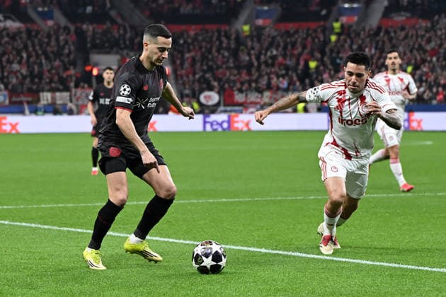 Lucas Vazquez Bayer 04 Leverkusen and Francisco Ortega Olympiakos FC in a duel during the UEFA Champions League 2025 26, Play offs, second leg match between Bayer 04 Leverkusen and Olympiakos Piraeus, BayArena on February 24, 2026 in Leverkusen, Germany, Germany Photo by Ralf Treese DeFodi Images Lucas Vazquez Bayer 04 Leverkusen and Francisco Ortega Olympiakos FC battle for the ball during the UEFA Champions League 2025 26 League Knockout Play off Second Leg match between Bayer 04 Leverkusen and Olympiacos FC at BayArena on February 24, 2026 in Leverkusen, Germany Photo by Ralf Treese DeFodi Images