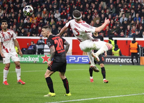 v l Mehdi Taremi Olympiakos Piraeus 99 , Alejandro Grimaldo Bayer Leverkusen, 20 , Lorenzo Pirola Olympiakos Piraeus 05 GER, Bayer 04 Leverkusen vs Olympiakos Piraeus, Football, Champions League, Play offs, Second leg, Season 2025 2026, 24 02 2026 GER, Bayer 04 Leverkusen vs Olympiakos Piraeus, Football, Champions League, Play offs, Second leg, Season 2025 2026, 24 02 2026 Leverkusen Copyright: xEibner-Pressefotox xThomasxStoecx EP_TSR