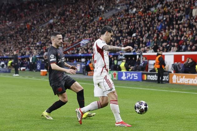 LEVERKUSEN (l-r) Lucas Vazquez of Bayer 04 Leverkusen, Clayton of Olympiakos during the UEFA Champions League match between Bayer 04 Leverkusen v Olympiakos Piraeus at the BayArena on February 24, 2026 in Leverkusen, Germany. BART STOUTJESDIJK ANP FOC 2026 2027 xVIxANPxSportx xBartxStoutjesdijkxIVx 551660948 originalFilename: 551660948.jpg