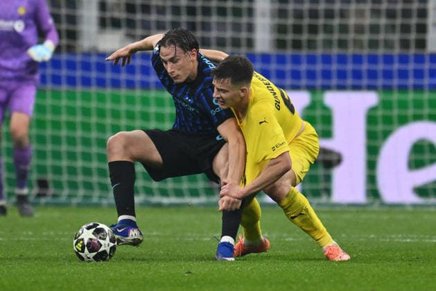 CALCIO - UEFA Champions League - Inter - FC Internazionale vs FK Bodo Glimt Francesco Pio Esposito of F.C. Inter and Jostein Gundersen of FK Bodo Glimt are in action during the UEFA Champions League 2025 26 League Knockout Play-off Second Leg match between F.C. Inter and FK Bodo Glimt at the San Siro Stadium on February 24, 2026 in Milan, Italy. Milan Italy  Copyright: xIPAxSport ABACAx