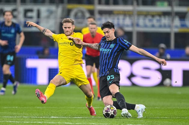 Ole Didrik Blomberg FK Bodo Glimt and Alessandro Bastoni FC Internazionale Milano battle for the ball during the UEFA Champions League 2025 26 League Knockout Play off Second Leg match between FC Internazionale Milano and FK Bodo Glimt at Stadio San Siro on February 24, 2026 in Milan, Italy Photo by Harry Langer DeFodi Images