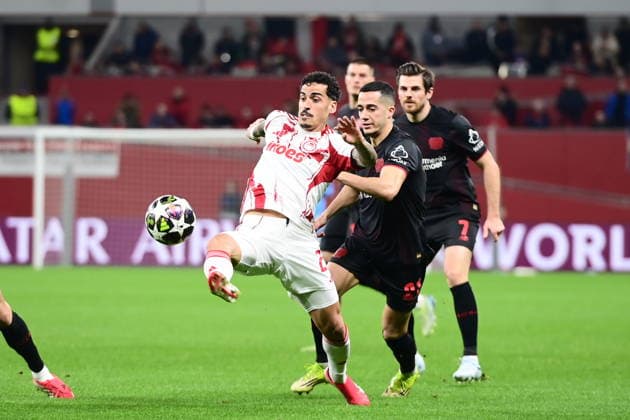UEFA Champions League - Bayer 04 Leverkusen vs Olympiacos FC - Chiquinho of Olympiacos FC in action againstLucas Vazquez of Bayer 04 Leverkusen during the UEFA Champions League Play-Offs 2nd leg soccer match between Bayer 04 Leverkusen and Olympiacos FC in BayArena, Leverkusen, Germany, on 24 February 2026. IMAGO ONE INCH PRODUCTIONS LEVERKUSEN GERMANY Copyright: xONExINCHxPRODUCTIONSx 6868421