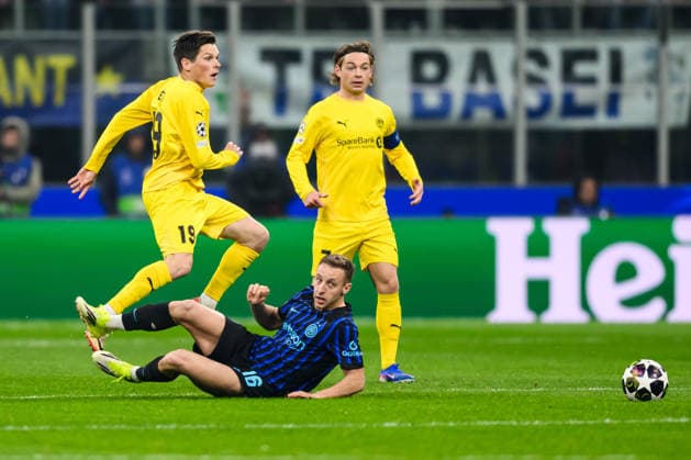 260224 Sondre Brunstad Fet of Bodo Glimt and Davide Frattesi of Inter during the UEFA Champions League football match between Inter and Bodo Glimt on February 24, 2026 in Milan Photo Marius Simensen BILDBYRAN COP 238 MM0057 bbeng football fotball fotboll soccer uefa champions league mesterligaen bodo glimt inter fc internazionale milano  Copyright: MARIUSxSIMENSEN BB260224BB473