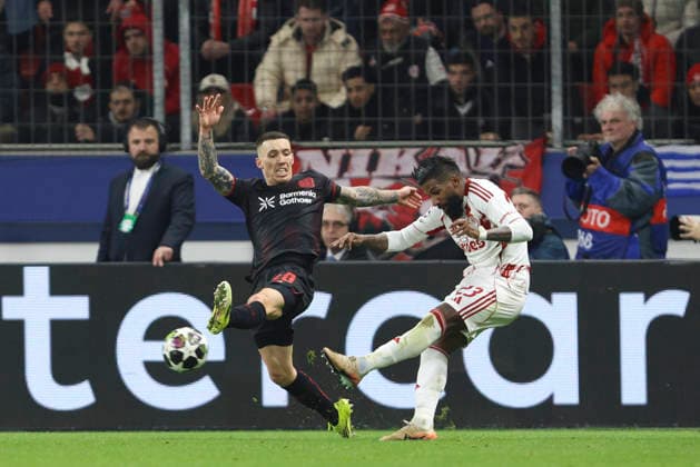 Alejandro Grimaldo Bayer 04 Leverkusen and Rodinei Olympiacos FC battle for the ball during the UEFA Champions League 2025 26 League Knockout Play off Second Leg match between Bayer 04 Leverkusen and Olympiacos FC at BayArena on February 24, 2026 in Leverkusen, Germany Photo by Oliver Kaelke DeFodi Images