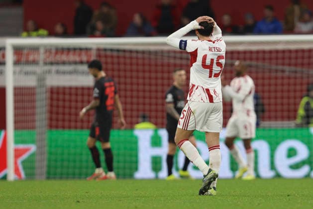 Panagiotis Retsos Olympiacos FC gestures, looks dejected during the UEFA Champions League 2025 26 League Knockout Play off Second Leg match between Bayer 04 Leverkusen and Olympiacos FC at BayArena on February 24, 2026 in Leverkusen, Germany Photo by Oliver Kaelke DeFodi Images