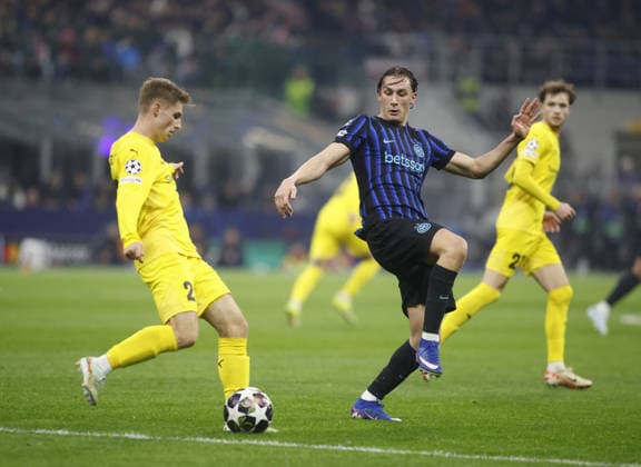 CALCIO - UEFA Champions League - Inter - FC Internazionale vs FK Bodo Glimt Fredrik Sjovold of FK Bodo Glimt and Pio Esposito of FC Inter during the Uefa Champions League, second leg play-off, season 2025-2026, football match between, FC Internazionale Milano v Fotballklubben Bodo Glimt on 24 February 2026 at â?? Giuseppe Meazza Stadium, San Siro, Milan, Italy Photo Nderim Kaceli Milan Italy  Copyright: xIPAxSport ABACAx