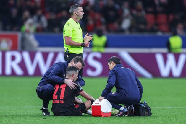 Soccer Champions League Play off second leg Bayer 04 Leverkusen Olympiakos Piraeus on 24 02 2026 at the BayArena in Leverkusen Lucas Vazquez Leverkusen is treated xJRx