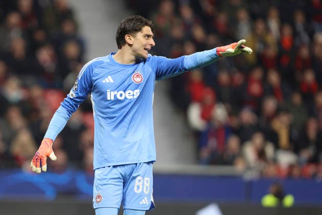 Goalkeeper Konstantinos Tzolakis Olympiacos FC gestures during the UEFA Champions League 2025 26 League Knockout Play off Second Leg match between Bayer 04 Leverkusen and Olympiacos FC at BayArena on February 24, 2026 in Leverkusen, Germany Photo by Oliver Kaelke DeFodi Images