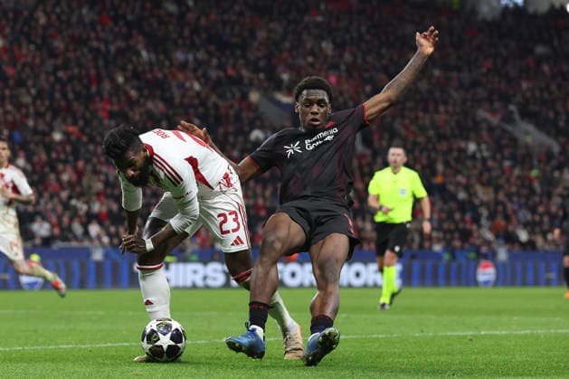 Rodinei Olympiacos FC and Ernest Poku Bayer 04 Leverkusen battle for the ball during the UEFA Champions League 2025 26 League Knockout Play off Second Leg match between Bayer 04 Leverkusen and Olympiacos FC at BayArena on February 24, 2026 in Leverkusen, Germany Photo by Oliver Kaelke DeFodi Images