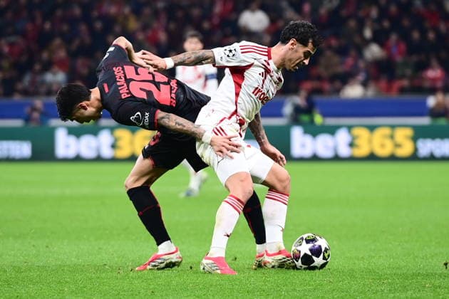 UEFA Champions League - Bayer 04 Leverkusen vs Olympiacos FC - Chiquinho of Olympiacos FC in action against Exequiel Palacios of Bayer 04 Leverkusen during the UEFA Champions League Play-Offs 2nd leg soccer match between Bayer 04 Leverkusen and Olympiacos FC in BayArena, Leverkusen, Germany, on 24 February 2026. IMAGO ONE INCH PRODUCTIONS LEVERKUSEN GERMANY Copyright: xONExINCHxPRODUCTIONSx 6868521