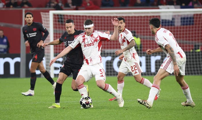v l Jarell Quansah Bayer Leverkusen, 04 , Lucas Vazques Bayer Leverkusen, 21 , Lorenzo Pirola Olympiakos Piraeus 05 , Chiquinho Olympiakos Piraeus 22 , Francisco Ortega Olympiakos Piraeus 03 GER, Bayer 04 Leverkusen vs Olympiakos Piraeus, Football, Champions League, Play offs, Second leg, 2025 2026 season, 24 02 2026 GER, Bayer 04 Leverkusen vs Olympiakos Piraeus, Football, Champions League, Play offs, Second leg, 2025 2026 season, 24 02 2026 Leverkusen Copyright: xEibner-Pressefotox xThomasxStoecx EP_TSR