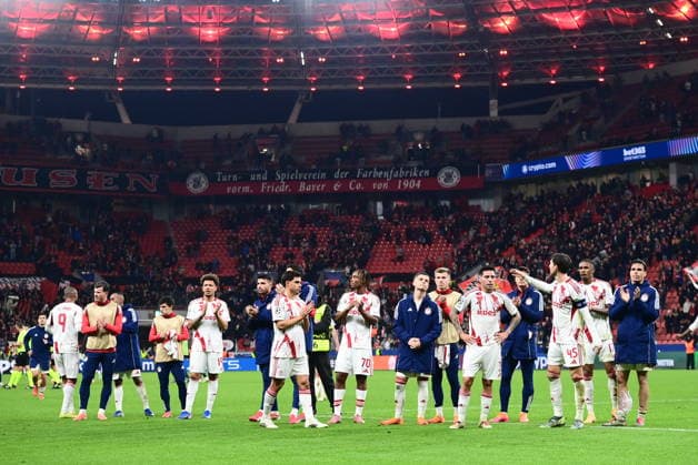 UEFA Champions League - Bayer 04 Leverkusen vs Olympiacos FC - Players of Olympiacos FC react at the end of the UEFA Champions League Play-Offs 2nd leg soccer match between Bayer 04 Leverkusen and Olympiacos FC in BayArena, Leverkusen, Germany, on 24 February 2026. IMAGO ONE INCH PRODUCTIONS LEVERKUSEN GERMANY Copyright: xONExINCHxPRODUCTIONSx 6868739