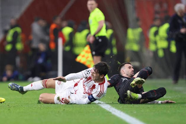 Panagiotis Retsos Olympiacos FC and Aleix Garcia Bayer 04 Leverkusen battle for the ball during the UEFA Champions League 2025 26 League Knockout Play off Second Leg match between Bayer 04 Leverkusen and Olympiacos FC at BayArena on February 24, 2026 in Leverkusen, Germany Photo by Oliver Kaelke DeFodi Images