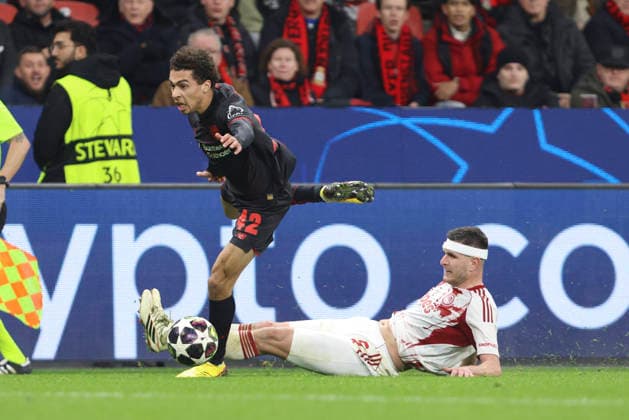 Montrell Culbreath Bayer 04 Leverkusen and Lorenzo Pirola Olympiacos FC battle for the ball during the UEFA Champions League 2025 26 League Knockout Play off Second Leg match between Bayer 04 Leverkusen and Olympiacos FC at BayArena on February 24, 2026 in Leverkusen, Germany Photo by Oliver Kaelke DeFodi Images