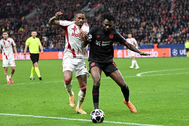 Andre Luiz Olympiakos FC and Edmond Tapsoba Bayer 04 Leverkusen in a duel during the UEFA Champions League 2025 26, Play offs, second leg match between Bayer 04 Leverkusen and Olympiakos Piraeus, BayArena on February 24, 2026 in Leverkusen, Germany, Germany Photo by Ralf Treese DeFodi Images Andre Luiz Olympiakos FC and Edmond Tapsoba Bayer 04 Leverkusen battle for the ball during the UEFA Champions League 2025 26 League Knockout Play off Second Leg match between Bayer 04 Leverkusen and Olympiacos FC at BayArena on February 24, 2026 in Leverkusen, Germany Photo by Ralf Treese DeFodi Images