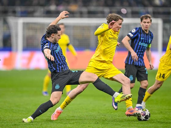 Carlos Augusto FC Internazionale Milano and Isak Dybvik Määttä FK Bodo Glimt battle for the ball during the UEFA Champions League 2025 26 League Knockout Play off Second Leg match between FC Internazionale Milano and FK Bodo Glimt at Stadio San Siro on February 24, 2026 in Milan, Italy Photo by Harry Langer DeFodi Images