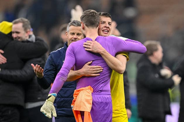 Goalkeeper Nikita Haikin FK Bodo Glimt and Jostein Gundersen FK Bodo Glimt gestures during the UEFA Champions League 2025 26 League Knockout Play off Second Leg match between FC Internazionale Milano and FK Bodo Glimt at Stadio San Siro on February 24, 2026 in Milan, Italy Photo by Harry Langer DeFodi Images