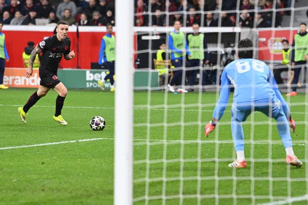 Alejandro GRIMALDO LEV vs Goalkeeper Konstantinos TZOLKIS PI Action, Duel, Football Champions League, Play Offs, Bayer 04 Leverkusen LEV Olympiakos Piraeus PI 0 0 on 24 02 2026 in Leverkusen Germany UEFA regulations prohibit any use of photographs as image sequences and or quasi video Â