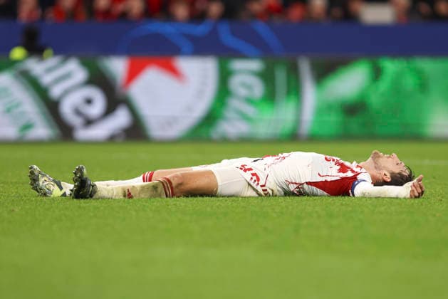 Panagiotis Retsos Olympiacos FC looks dejected during the UEFA Champions League 2025 26 League Knockout Play off Second Leg match between Bayer 04 Leverkusen and Olympiacos FC at BayArena on February 24, 2026 in Leverkusen, Germany Photo by Oliver Kaelke DeFodi Images