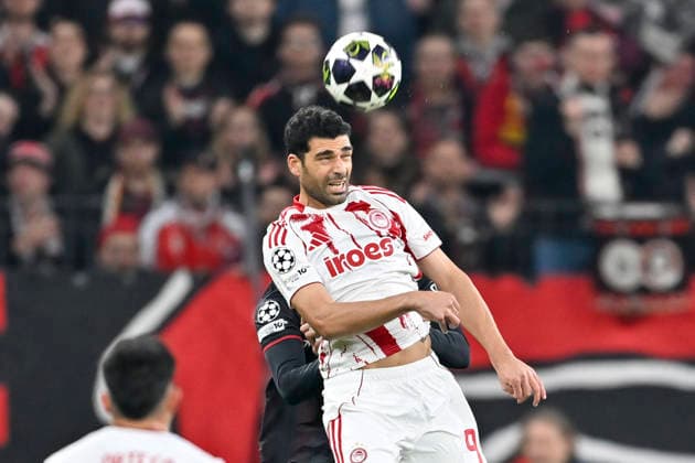 Mehdi Taremi Piraeus 99 header header duel Jarell Quansah Leverkusen 4 obscured 24 02 2026 Soccer Champions League, Bayer Leverkusen vs Olympiakos Piraeus, BayArena, Leverkusen, Copyright: xpepphotox xHorstxMauelshagenx pep00321, pep_20260224_hm_290497