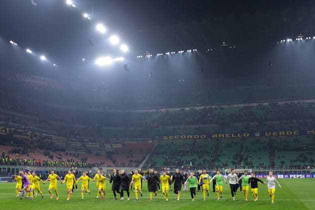 Milan, Italy, 24th February 2026. FK Bodo Glimt players and staff celebrate the 2-1 victory on the night and 5-2 aggregate score following the Internazionale vs FK Bodo Glimt UEFA Champions League Play Off 2nd Leg match at Giuseppe Meazza, Milan. Picture credit should read: Jonathan Moscrop Sportimage EDITORIAL USE ONLY. No use with unauthorised audio, video, data, fixture lists, club league logos or live services. Online in-match use limited to 120 images, no video emulation. No use in betting, games or single club league player publications. SPI_016_INTER_BODOGLIMT_UCL_ SPI-4550-0016