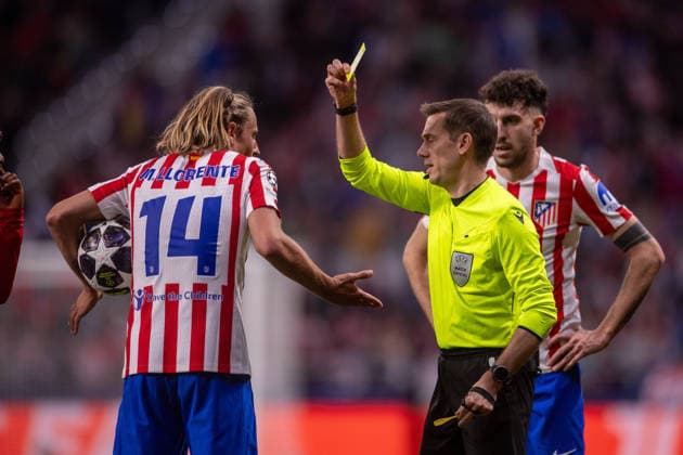 February 24, 2026, Madrid, Madrid, Spain: MADRID, SPAIN - FEBRUARY 24: CLEMENT TURPIN referee of the game is seen showing a yellow card to MARCOS LLORENTE of Atletico de Madrid during the UEFA Champions League 2025 26 Knockout match second lag between Atletico de Madrid and Club Brugge KV, at Riyadh Air Metropolitano Stadium on February 23, 2026 in Madrid, Spain Madrid Spain - ZUMAl192 20260224_zsp_l192_072 Copyright: xMiguelxLemosx