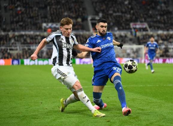 Harvey Barnes of Newcastle United (left) and Toral Bayramov of Qarabag Newcastle United v Qarabag, UEFA Champions League, Knockout Round Play-Offs, Second Leg, Football, St James Park, Newcastle, UK - 24 Feb 2026Newcastle St James Park Azerbaijan EDITORIAL USE ONLY No use with unauthorised audio, video, data, fixture lists, club league logos or live services. Online in-match use limited to 120 images, no video emulation. No use in betting, games or single club league player publications. Copyright: xRichardxLee Shutterstockx 16693044ct