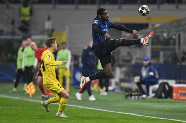Fredrik Sjovold of FK Bodo Glimt and Ange-Yoan Bonny of F.C. Inter are in action during the UEFA Champions League 2025 26 League Knockout Play-off Second Leg match between F.C. Inter and FK Bodo Glimt at the San Siro Stadium on February 24, 2026 in Milan, Italy.  Copyright: xDomenicoxCippitelli IPAxSportx xipa-agency.netx xx IPA_71988782 IPA_Agency_IPA71988782