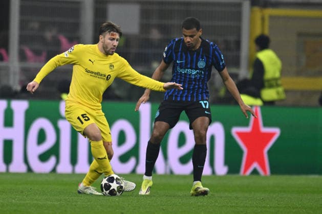 Fredrik Andre Bjorkan of FK Bodo Glimt and Andy Diouf of F.C. Inter are in action during the UEFA Champions League 2025 26 League Knockout Play-off Second Leg match between F.C. Inter and FK Bodo Glimt at the San Siro Stadium on February 24, 2026 in Milan, Italy.  Copyright: xDomenicoxCippitelli IPAxSportx xipa-agency.netx xx IPA_71988849 IPA_Agency_IPA71988849