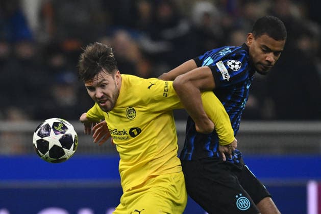 Fredrik Andre Bjorkan of FK Bodo Glimt and Andy Diouf of F.C. Inter are in action during the UEFA Champions League 2025 26 League Knockout Play-off Second Leg match between F.C. Inter and FK Bodo Glimt at the San Siro Stadium on February 24, 2026 in Milan, Italy.  Copyright: xDomenicoxCippitelli IPAxSportx xipa-agency.netx xx IPA_71988854 IPA_Agency_IPA71988854