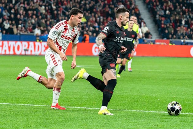 UEFA Champions League 2025 2026 Bayer 04 Leverkusen vs Olympiakos Piraeus, Play Offs second leg, Tuesday, 23 02 2026 BayArena Nordrhein Westfalen, Germany Aleix Garcia 24 Santiago Hezze Olympiakos Piraeus, 32 Copyright: xCelinaxLeiersx
