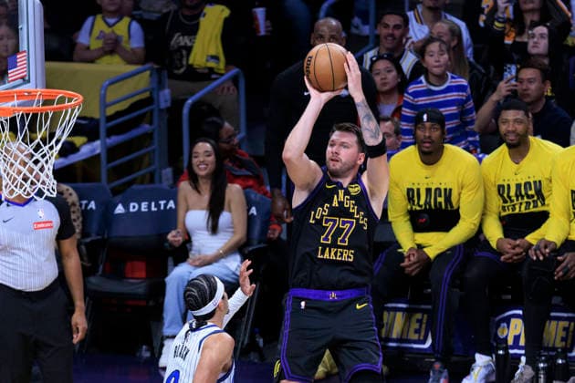 February 24, 2026, Los Angeles, California, USA: Luka Doncic 77 of the Los Angeles Lakers shoots a floater as Anthony Black 0 of the Orlando Magic defends the basket during their regular season NBA, Basketball Herren, USA game on Tuesday February 24, 2026 at Crypto.com Arena in Los Angeles, California. ARIANA RUIZ PI Los Angeles USA - ZUMAp124 20260224_zaa_p124_015 Copyright: xArianaxRuizx
