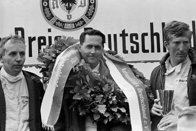 The podium (L to R): John Surtees (GBR) Cooper second; Jack Brabham (AUS) Brabham race winner; Jochen Rindt (AUT) Cooper third...German Grand Prix, Nurburgring, 7 August 1966. Copyright: xSuttonxMotorsportsx
