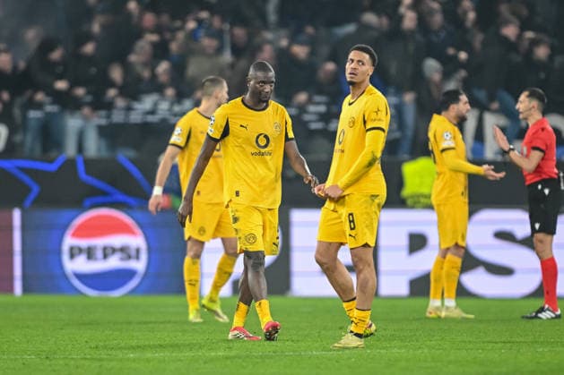 Serhou Guirassy Borussia Dortmund and Felix Nmecha Borussia Dortmund look dejected during the UEFA Champions League 2025 26 League Knockout Play off Second Leg match between Atalanta BC and Borussia Dortmund at Stadio di Bergamo on February 25, 2026 in Bergamo, Italy Photo by Harry Langer DeFodi Images