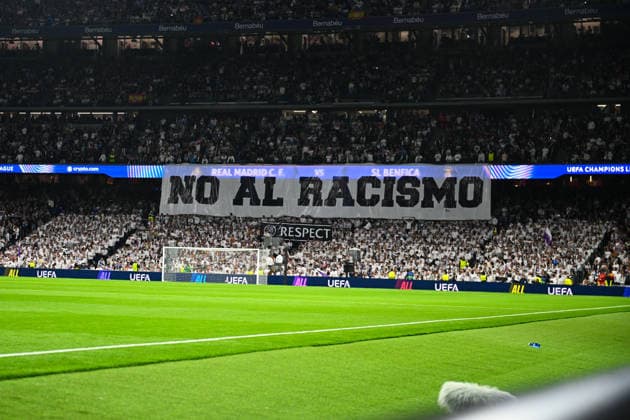 February 25, 2026, Madrid, Guimaraes, Spain: Real Madrid CF supporter seen with a message during the UEFA Champions League 2025 26 League Knockout Play-off Second Leg match between Real Madrid C.F. and SL Benfica at Estadio Santiago Bernabeu on February 25, 2026 in Madrid, Spain. Real Madrid C.F. V SL Benfica - UEFA Champions League 2025 26 League Knockout Play-Off Second Leg  - ZUMAl192 20260225_zsp_l192_016 Copyright: xMiguelxLemosx