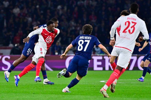 FOOTBALL : PSG vs Monaco - Ligue des Champions - 25 02 2026 Folarin Balogun ( 9 - Monaco ) and William Joel Tenorio Pacho ( 51 - PSG ) during the UEFA Champions League match between Paris Saint Germain and AS Monaco at Parc Des Princes on February 25 , 2026 in Paris, France. ( Photo by Federico Pestellini PsnewZ ) ParisFrance  Copyright: xFedericoxPestellinix