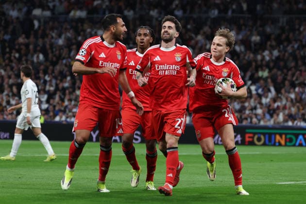Madrid, Spain February 25, 2026 FBL UEFA Champions League 2025 26 Real Madrid SL Benfica Vangelis Pavlidis S L Benfica , Rafa S L Benfica , Andreas Schjelderup S L Benfica celebrates after scoring a goal to 0 1 during the UEFA Champions League 2025 26 knockout play offs match between Real Madrid and SL Benfica at the Santiago BernabÃ u Stadium on February 25, 2026 in Madrid, Spain Copyright: JoaquimxFerreira