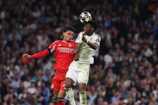 Madrid, Spain February 25, 2026 FBL UEFA Champions League 2025 26 Real Madrid SL Benfica Richard Rios S L Benfica , Aurelien Tchouameni Real Madrid battles for the Ball during the UEFA Champions League 2025 26 knockout play offs match between Real Madrid and SL Benfica at the Santiago BernabÃ u Stadium on February 25, 2026 in Madrid, Spain Copyright: JoaquimxFerreira