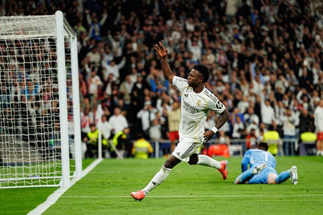 Vinicius Vini Junior seen celebrating after scoring goal during Champions League knock out play off game between teams of Real Madrid CF and SL Benfica (Maciej Rogowski Ball Raw Images) Madrid Bernabeu Spain Copyright: xMaciejxRogowskix maciejrogowski_real_benfica_2526-01