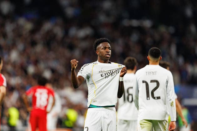 Vinicius Vini Junior seen celebrating after scoring goal during Champions League knock out play off game between teams of Real Madrid CF and SL Benfica (Maciej Rogowski Ball Raw Images) Madrid Bernabeu Spain Copyright: xMaciejxRogowskix maciejrogowski_real_benfica_2526-32