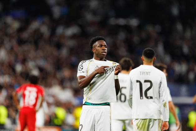 Vinicius Vini Junior seen celebrating after scoring goal during Champions League knock out play off game between teams of Real Madrid CF and SL Benfica (Maciej Rogowski Ball Raw Images) Madrid Bernabeu Spain Copyright: xMaciejxRogowskix maciejrogowski_real_benfica_2526-34
