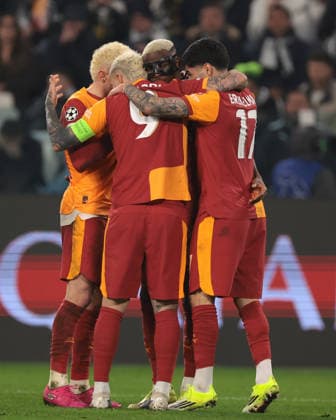 Turin, Italy, 25th February 2026. gVictor Osimhen of Galatasaray SK celebrates with team mates after scoring to pull a goal back and reduce the arrears to 3-1 during the Juventus vs Galatasaray UEFA Champions League Knockout Play Off 2nd Leg match at Allianz Stadium, Turin. Picture credit should read: Jonathan Moscrop Sportimage EDITORIAL USE ONLY. No use with unauthorised audio, video, data, fixture lists, club league logos or live services. Online in-match use limited to 120 images, no video emulation. No use in betting, games or single club league player publications. SPI_037_JUVE_GALATASARAY_UCL_ SPI-4551-0037
