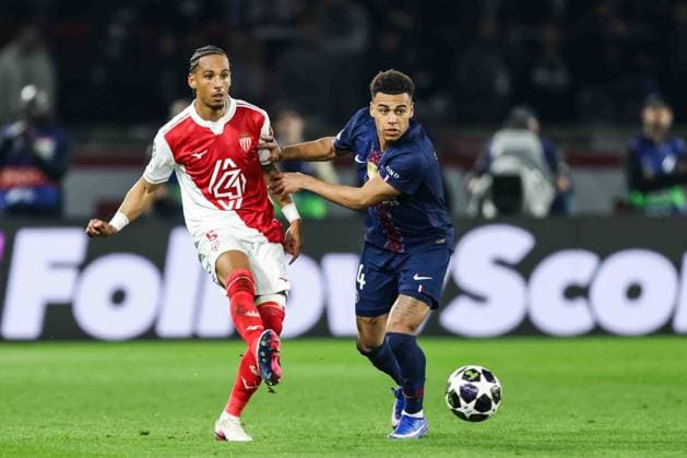 Paris Saint-Germain v AS Monaco - UCL PARIS, FRANCE - FEBRUARY 25: Thilo Kehrer of AS Monaco (L) and Desire Doue of Paris Saint-Germain (R) during the UEFA Champions League play-off second leg football match between Paris Saint-Germain (PSG) and AS Monaco at the Parc des Princes stadium in Paris. Ibrahim Ezzat Anadolu Paris France. Editorial use only. Please get in touch for any other usage.  Copyright: x2026xAnadoluxÄ°brahimxEzzatx
