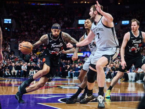 February 25, 2026, Toronto, On, Canada: Toronto Raptors Brandon Ingram (3) drives through San Antonio Spurs Devin Vassell (24), centre, and Luke Kornet (7) during first half NBA, Basketball Herren, USA basketball action in Toronto, on Wednesday, Feb. 25, 2026. Canada News - February 25, 2026 - ZUMAc35_ 20260225_zaf_c35_094 Copyright: xSammyxKoganx