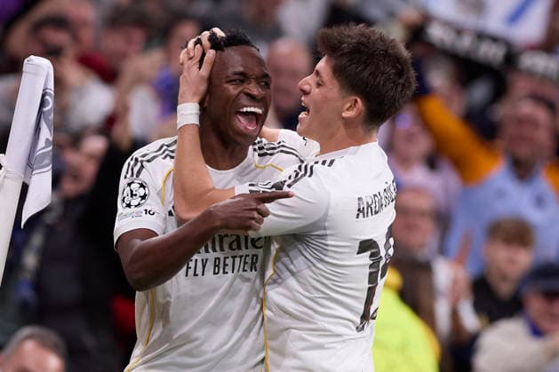 February 25, 2026, Madrid, Spain: Vinicius Junior (L) of Real Madrid CF and Arda Guler (R) of Real Madrid CF celebrate a goal during the UEFA Champions League 2025 2026 knockout play-off second leg match between Real Madrid CF and SL Benfica at Santiago Bernabeu Stadium. Final score Real Madrid CF 2 : 1 SL Benfica Madrid Spain - ZUMAs197 20260225_aaa_s197_216 Copyright: xFedericoxTitonex