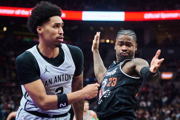 February 25, 2026, Toronto, On, Canada: Toronto Raptors Jamal Shead (23) reacts as San Antonio Spurs Dylan Harper (2) drives past him during first half NBA, Basketball Herren, USA basketball action in Toronto, on Wednesday, Feb. 25, 2026. Canada News - February 25, 2026 - ZUMAc35_ 20260225_zaf_c35_117 Copyright: xSammyxKoganx