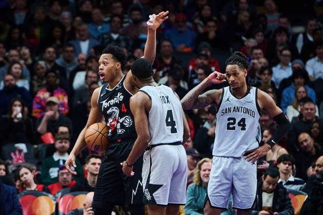 February 25, 2026, Toronto, On, Canada: Toronto Raptors Scottie Barnes (left) reacts to a foul call as San Antonio Spurs De Aaron Fox (centre), and Devin Vassell (24) look on during second half NBA, Basketball Herren, USA basketball action in Toronto, on Wednesday, Feb. 25, 2026. Canada News - February 25, 2026 - ZUMAc35_ 20260225_zaf_c35_121 Copyright: xSammyxKoganx