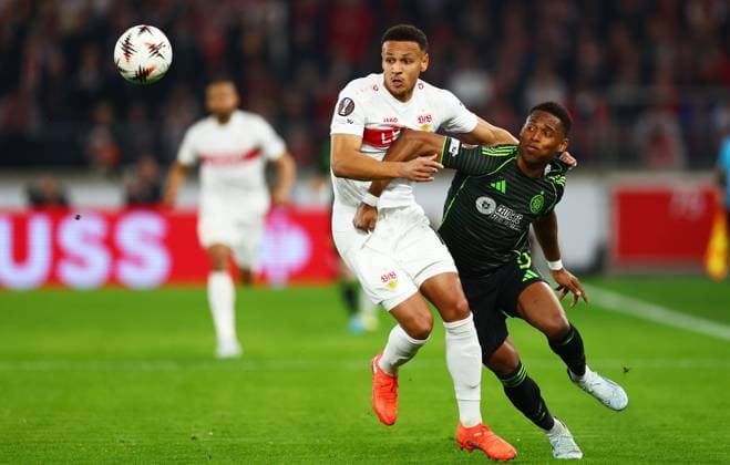Luca Jaquez of Stuttgart and Junior Adamu of Celtic. Stuttgart v Celtic, UEFA Europa League, Knockout Round Play Offs, Second Leg, Football, MHP Arena, Stuttgart, Germany - 26 Feb 2026Stuttgart MHP Arena Germany EDITORIAL USE ONLY No use with unauthorised audio, video, data, fixture lists, club league logos or live services. Online in-match use limited to 120 images, no video emulation. No use in betting, games or single club league player publications.  Copyright: xJamesxMarsh Shutterstockx 16701577av