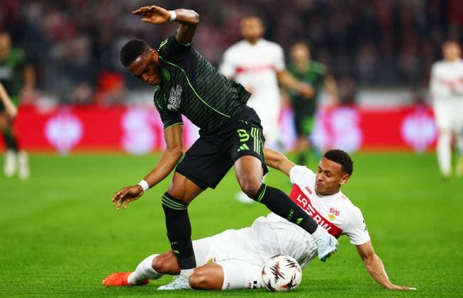 Luca Jaquez of Stuttgart and Junior Adamu of Celtic. Stuttgart v Celtic, UEFA Europa League, Knockout Round Play Offs, Second Leg, Football, MHP Arena, Stuttgart, Germany - 26 Feb 2026Stuttgart MHP Arena Germany EDITORIAL USE ONLY No use with unauthorised audio, video, data, fixture lists, club league logos or live services. Online in-match use limited to 120 images, no video emulation. No use in betting, games or single club league player publications. Copyright: xJamesxMarsh Shutterstockx 16701577aw